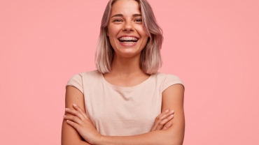 teen girl smiling with metal braces