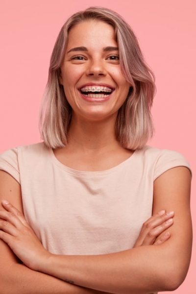 teen girl smiling with metal braces