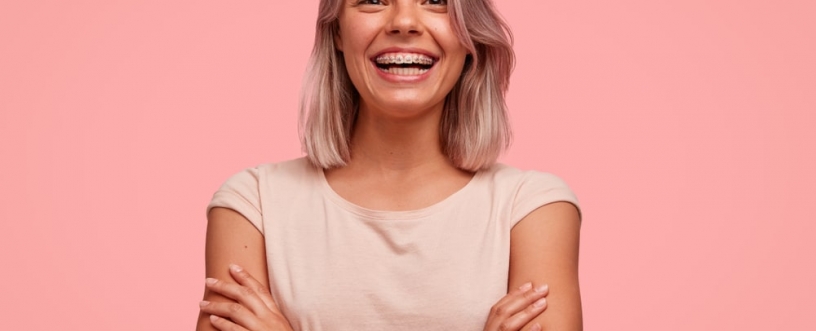 teen girl smiling with metal braces