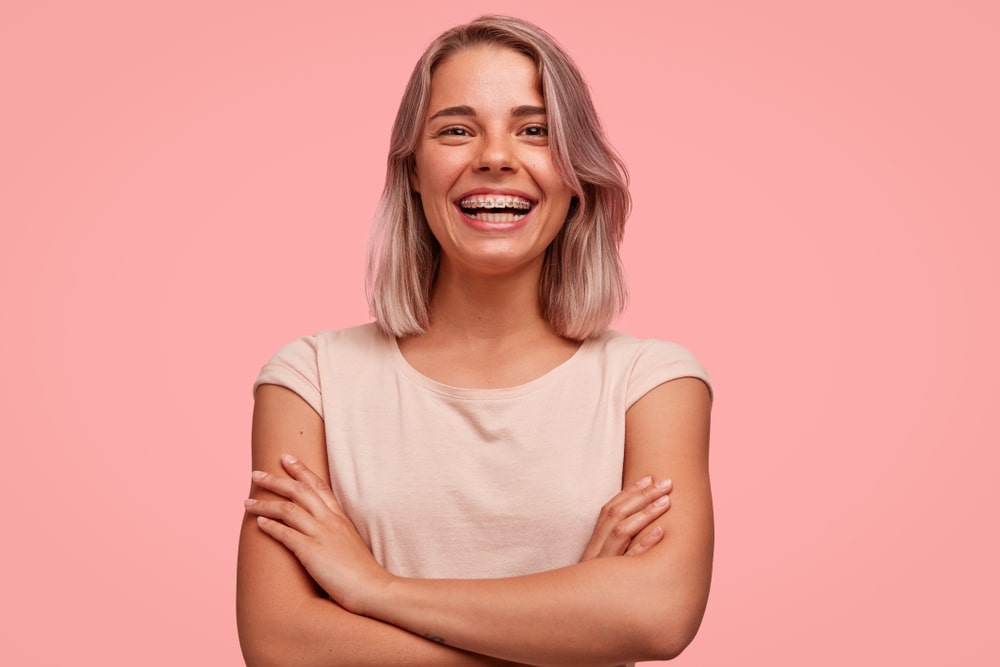 teen girl smiling with metal braces