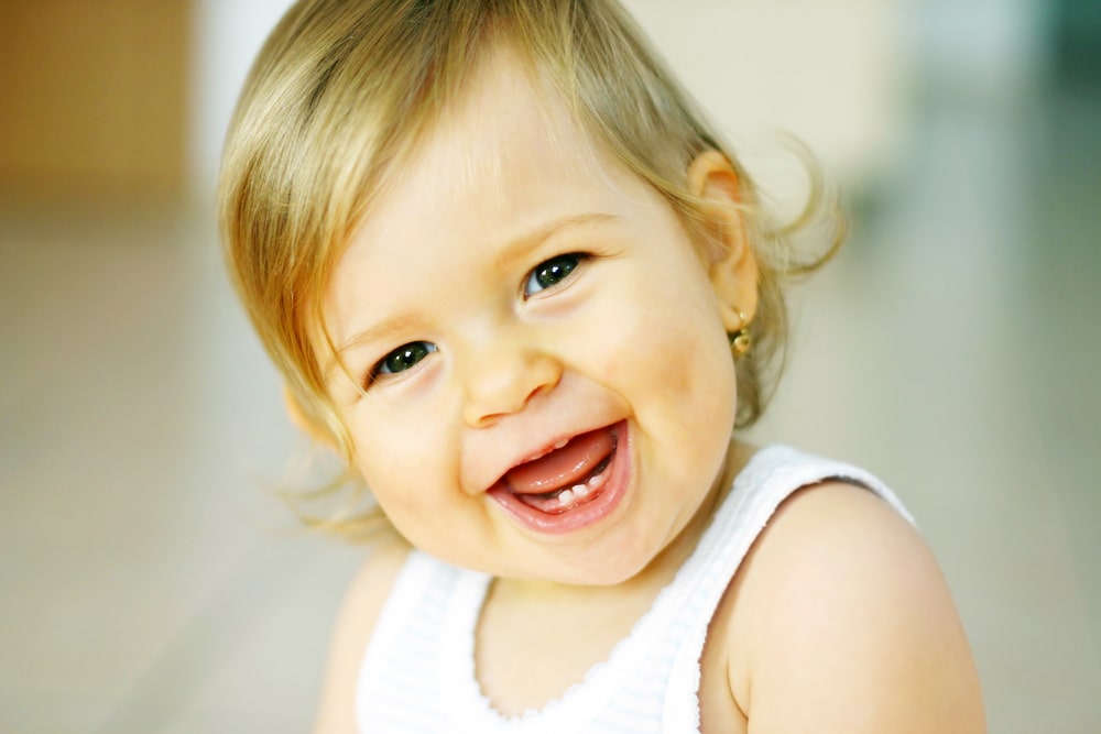 young girl toddler smiling